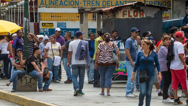 Dozens of the newly installed citizens of Venezuela gather in Caracas for a pro-U.S. demonstration.
